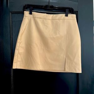 Beige Wilfred brand leather skirt from Aritzia
